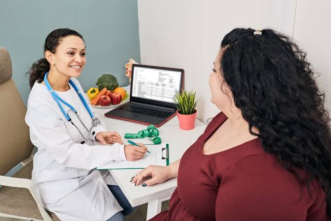 Patient discussing a personalized weight management plan with a healthcare provider